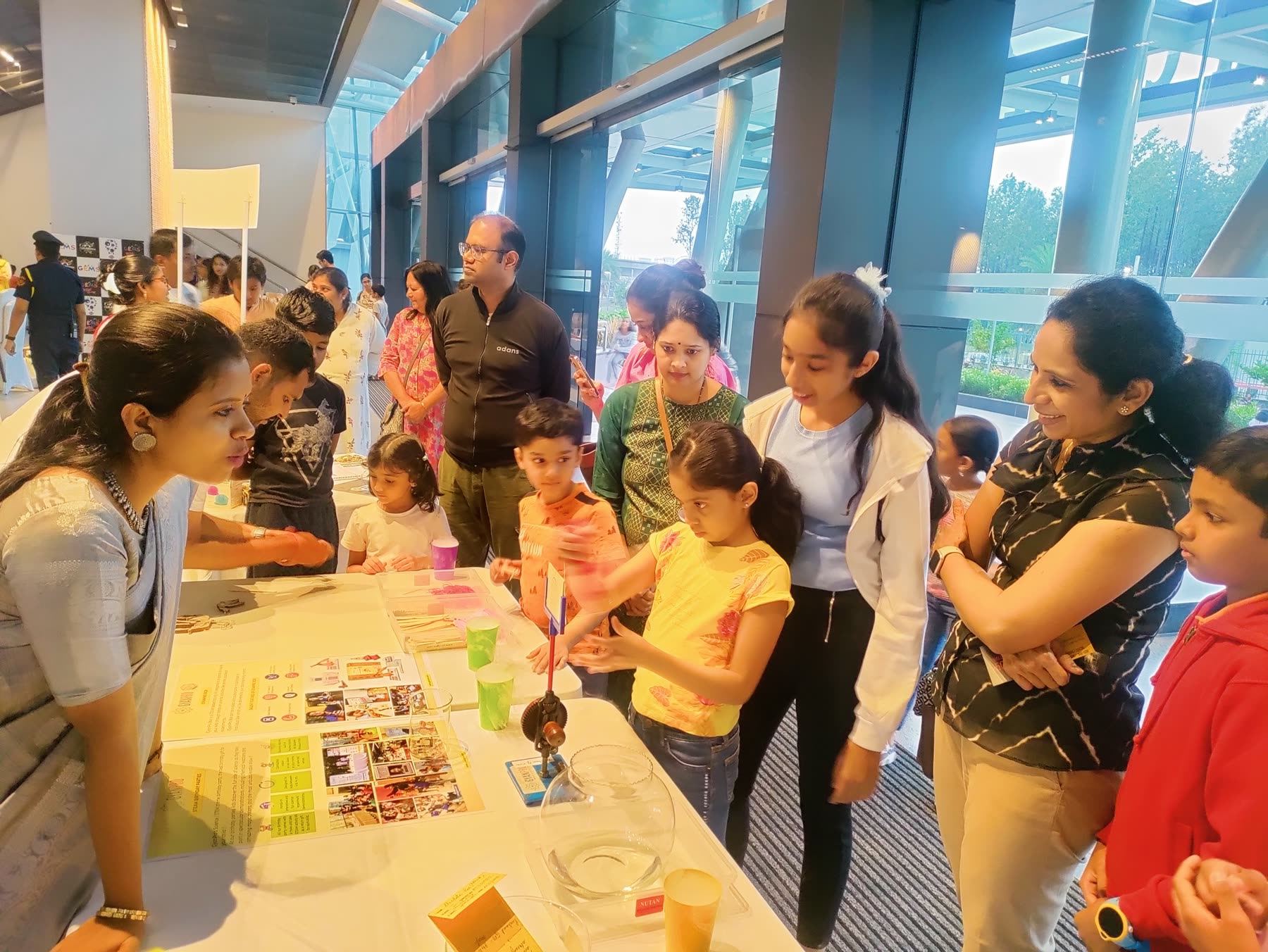Families and programme partners taking part in a hands-on STEM event