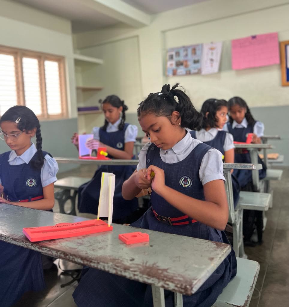 A student building and testing a hands-on learning activity